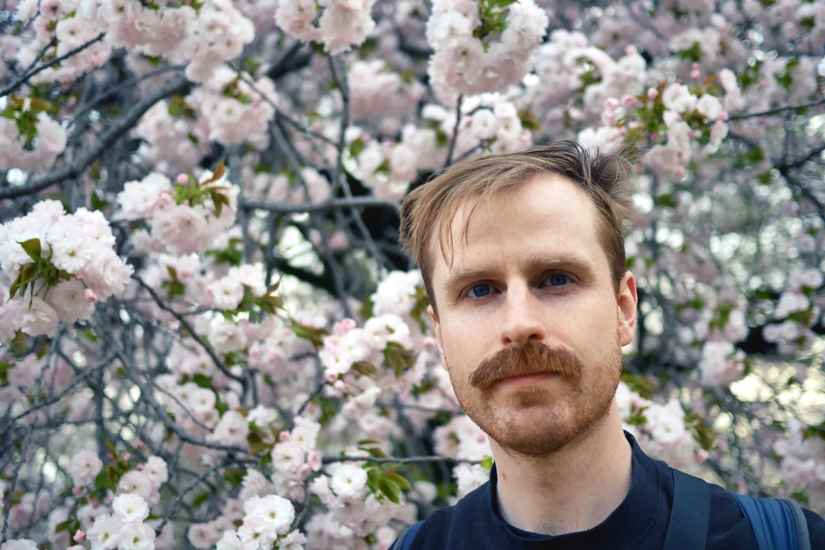 A picture of me in front of cherry blossom